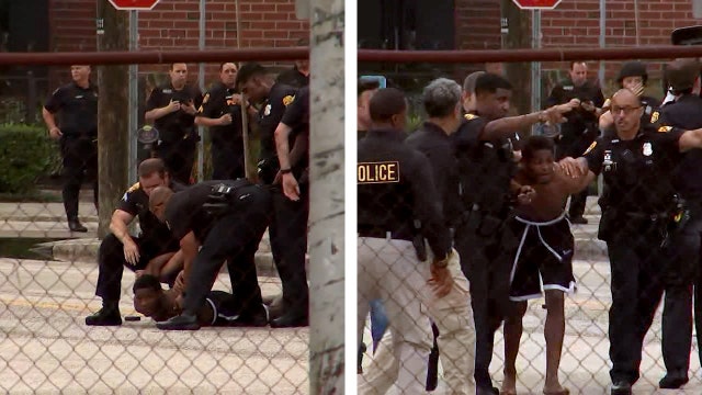 Suspect, off-duty officer exchange gunfire inside downtown Tampa apartment building: police