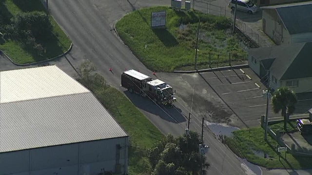 Businesses evacuated after hazardous materials catch fire in Holiday