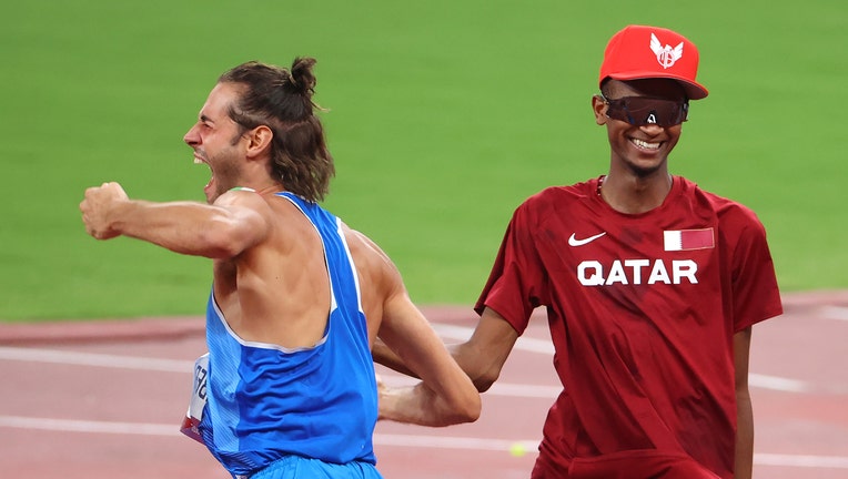 High jumpers Tamberi, Barshim agree to share gold medal in