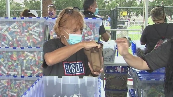 Warrick Dunn invites fans to help fill care packages during Cowboys-Bucs game