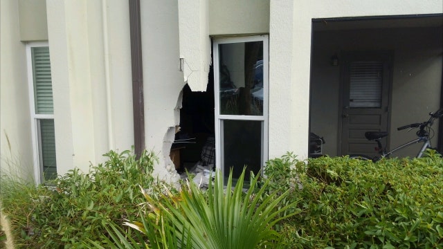 Largo driver pressed accelerator instead of brakes, crashes into apartment building, troopers say