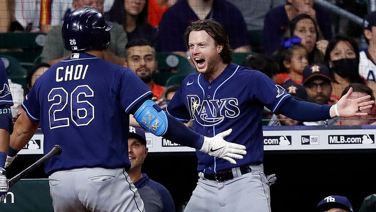 Tampa Bay Rays' Jose Siri heads for first base after hitting a