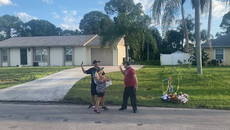 Fight between neighbor, protester breaks out near Brian Laundrie's family's home - FOX 13 Tampa Bay