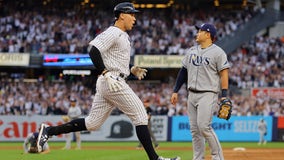 Judge delivers in 9th, Yanks clinch playoff spot in final at-bat