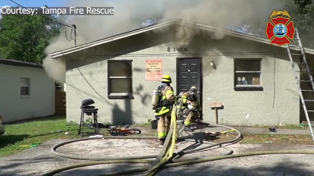 Tampa firefighters rescue wheelchair-bound resident after child allegedly sets house on fire