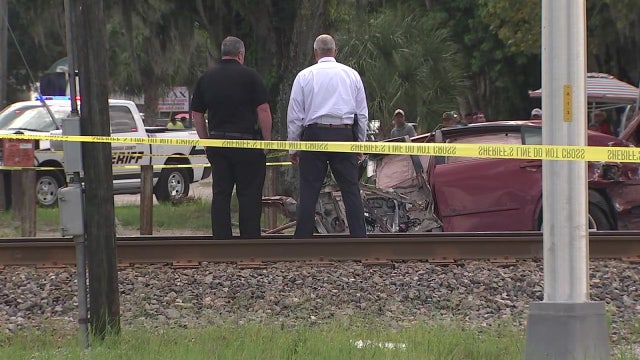 1 dead after train hits car in Dover