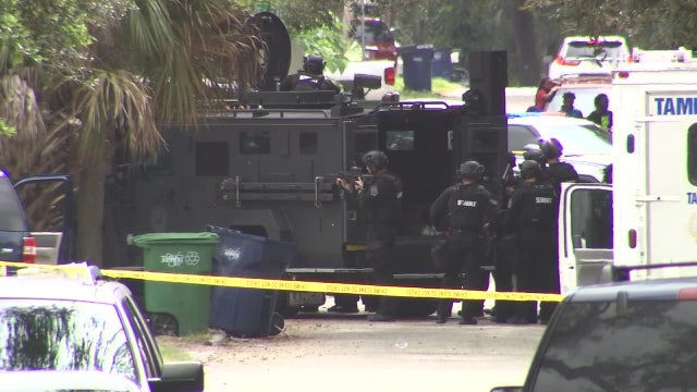 Police: Man who barricaded himself inside Tampa home arrested after pointing gun at roommates