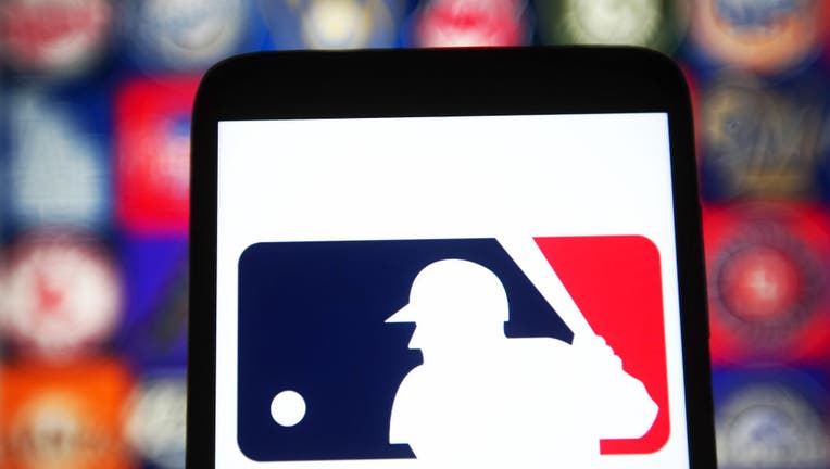 In this photo illustration a Major League Baseball (MLB)