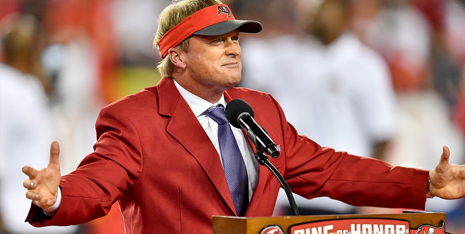 Head coach Jon Gruden of the Tampa Bay Buccaneers shakes hands