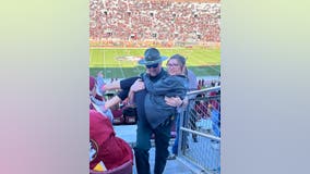 Florida deputy carries girl who was struggling to walk to her seat at FSU football game, sheriff's office says