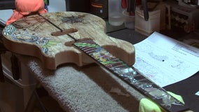 Veteran guitar instructor creating memorial instrument for fallen service members