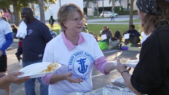 Boat captains, volunteers, business owners hold holiday fish fry for those in need