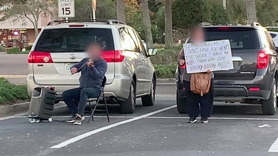 Police: Street performers tug on heartstrings for tips, but the music and story aren't real