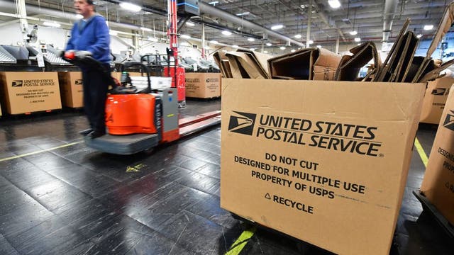Postal workers prepare for another pandemic crush of holiday gifts