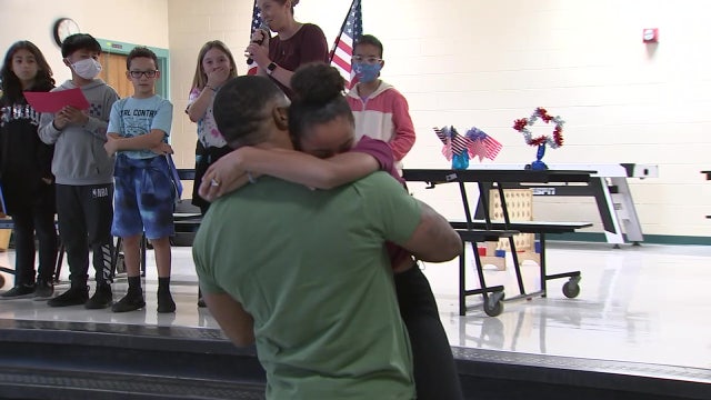 Dad returns from 9-month deployment to surprise daughter at elementary school