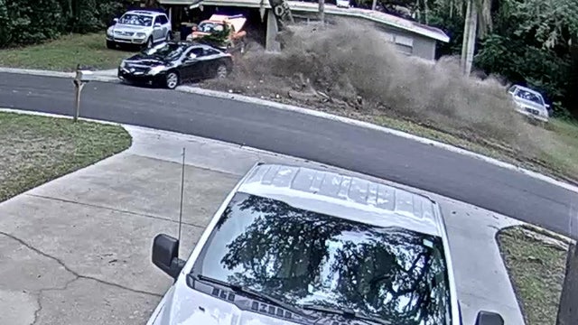 Video shows careening car narrowly miss Clearwater home