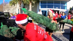 ‘It’s the right thing to do’: YMCA volunteers help play Santa to hundreds of St. Pete children