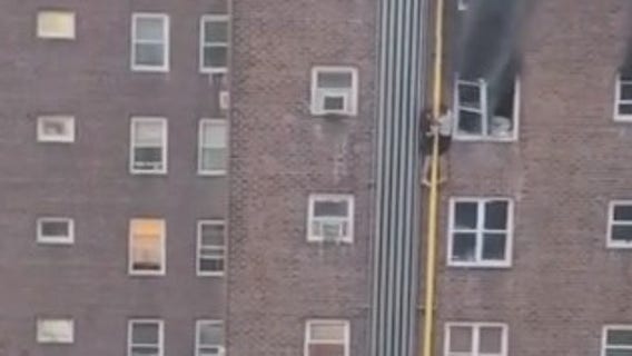 DRAMATIC VIDEO: 2 teens crawl down building to escape deadly fire