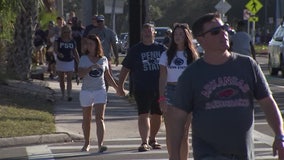 College football fans flock to Tampa bowl game