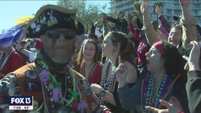 Gasparilla parade: Pirates donned beads, boots, bundled layers, but few masks as they paraded down Bayshore