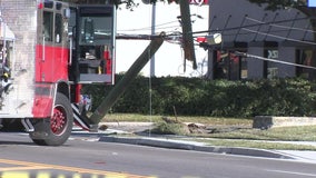 Dump truck crash downs power lines on Dale Mabry in South Tampa