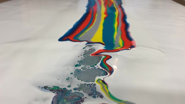 Tampa artist ditches paint brush for blow-dryer to create magically marbled pieces