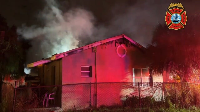 Tampa officials investigate overnight house fire