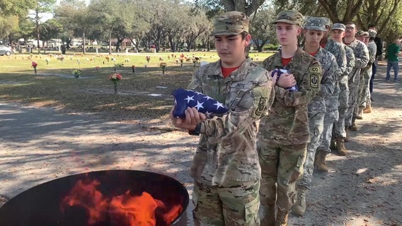 ROTC students retire American flag, clean headstones at Zephyrhills cemetery