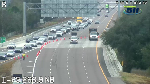 FHP: Pedestrian killed after walking into path of car on I-75