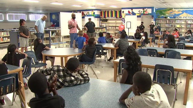 Former NFL players inspire children to go for their dreams
