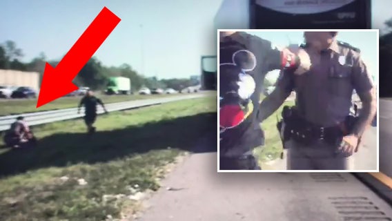 Video: Tampa drivers stop to help FHP trooper attacked by pedestrian on I-4