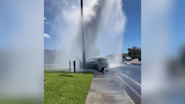 SUV hits aboveground water main in St. Petersburg