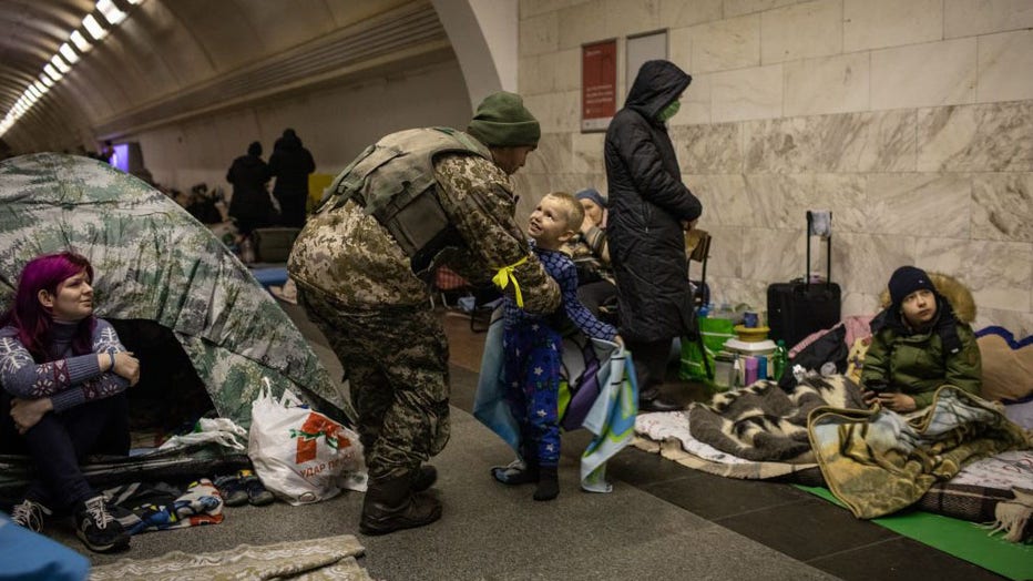 Ukrainian-soldier-visits-son.jpg