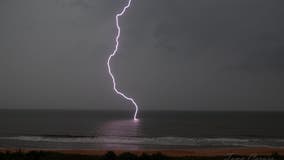 Photo shows lightning striking water at Flagler Beach