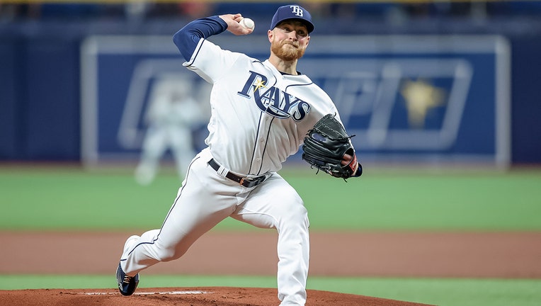 Seattle Mariners' Yohan Ramirez pitches during a spring training