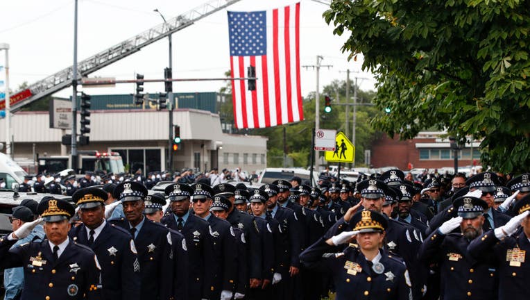 dc8e18d4-Funeral Held For Chicago Police Officer Killed In The Line Of Duty