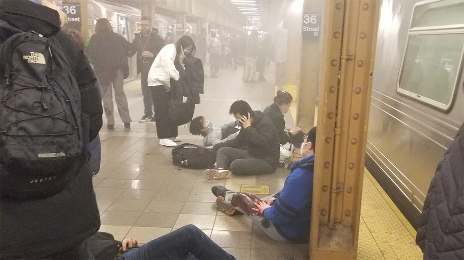 Victims are seen on the subway platform after a shooting in a Brooklyn subway station. (Armen Armenian/Facebook )