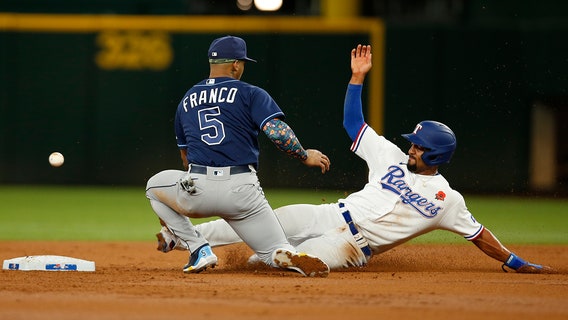 White goes deep after taking home run away as Rangers beat Rays