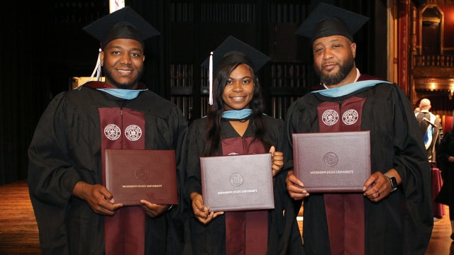 Dad, son, and daughter graduate together, earn master's degrees in education