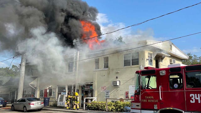 Massive fire spreads to attic of East Tampa apartment building
