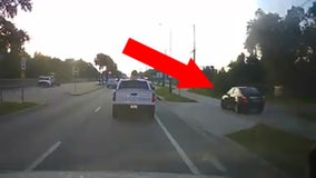 Sarasota driver caught on camera driving on sidewalk to avoid rush hour traffic