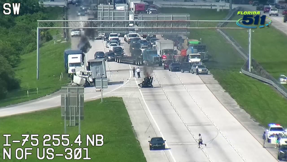 FHP: Woman killed after gas tank falls on car following fiery tractor-trailer crash on I-75