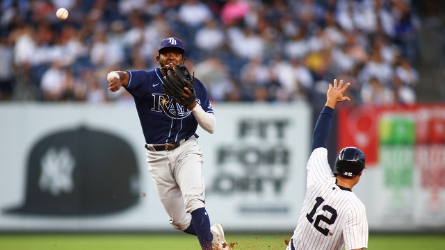 Yanks edge Rays for 14th straight home win