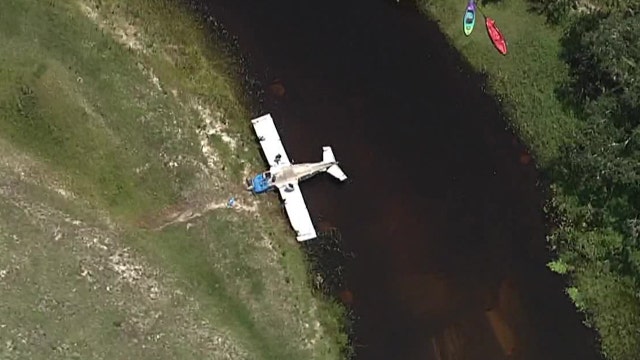 Pilot uninjured after small plane crashes, flips over in Myakka River