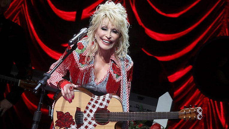 Dolly Parton performs on stage