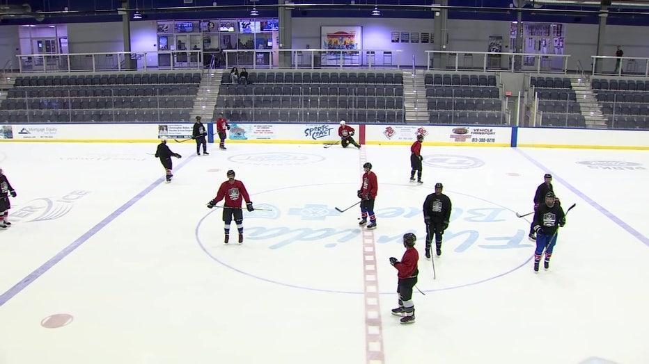 Members of the Tampa Warriors Hockey Program on ice