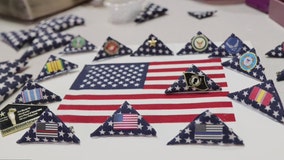 Neatly folding American flags is about patriotism for veteran called Navy Mom Mary