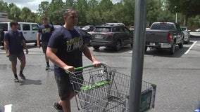 Steinbrenner High football team helps with 'little things' by returning shopping carts