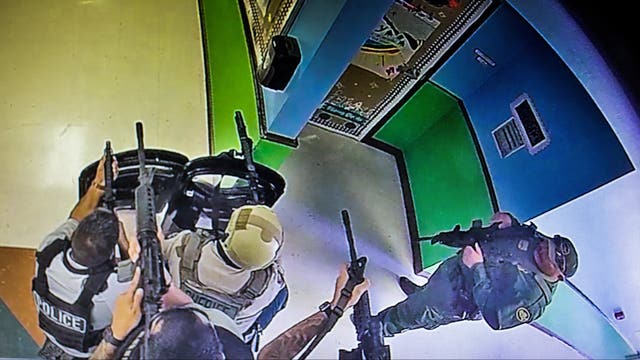 Uvalde officer who drew outrage for checking phone was waiting to hear from dying wife, lawmaker says