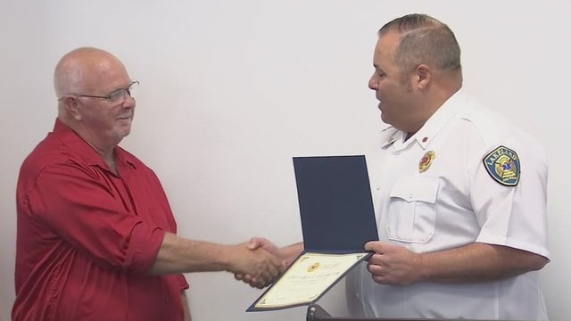 Publix employee honored for bravery after saving man from burning car